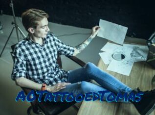 A0TattooedTomas